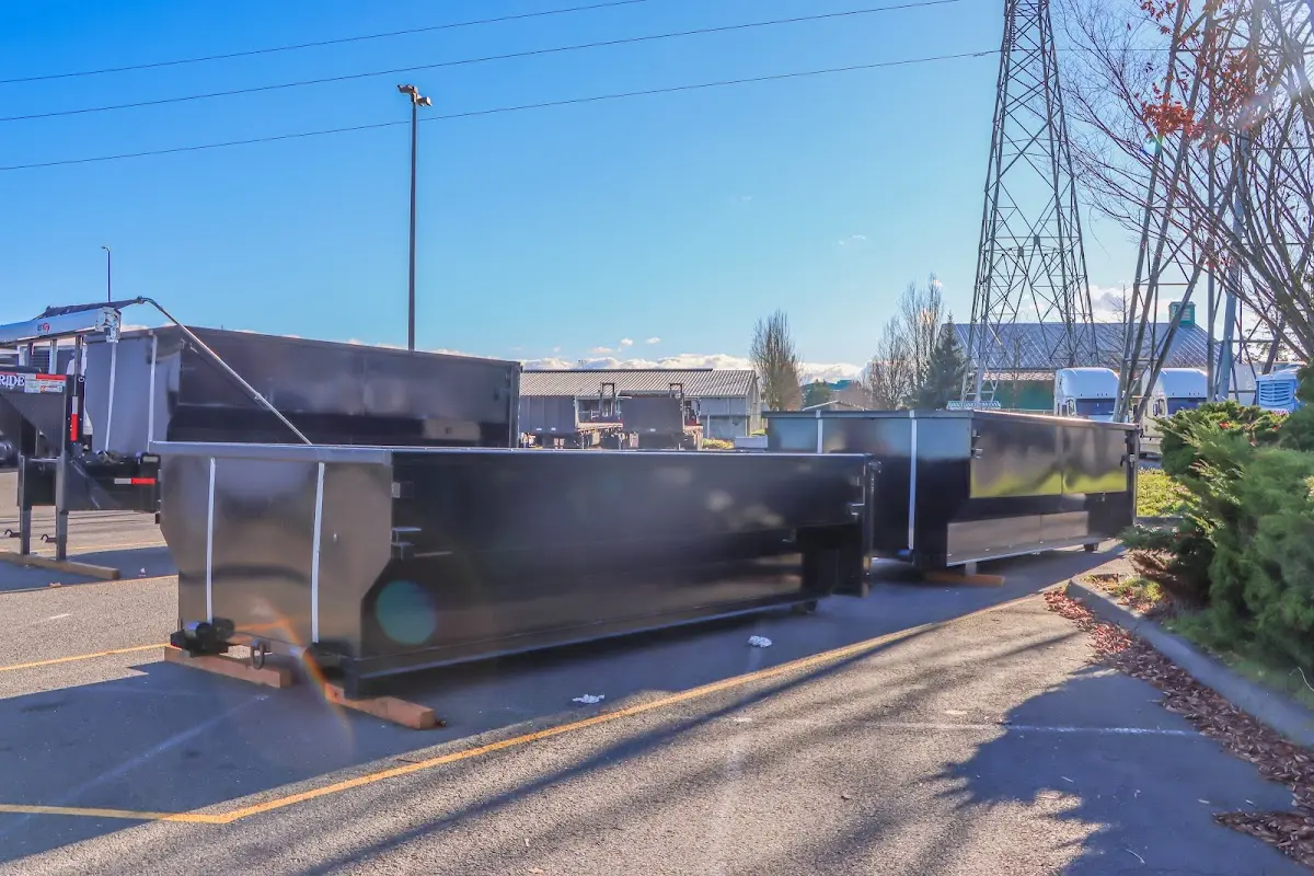 Roll-off dumpster ready for waste disposal at job site for 12 Yard Dumpster Rental in Sylacauga